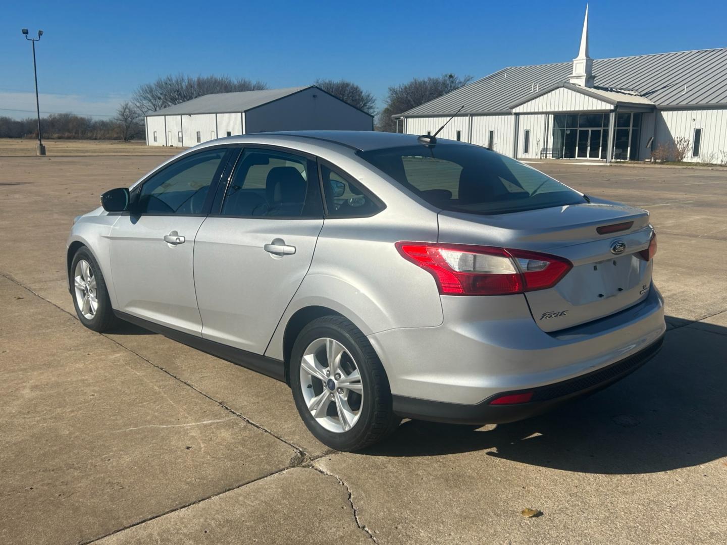 2013 Silver /Gray Ford Focus SEL FWD (1FADP3F2XDL) with an 2.4L engine, AUTOMATIC transmission, located at 17760 Hwy 62, Morris, OK, 74445, (918) 733-4887, 35.609104, -95.877060 - Photo#6